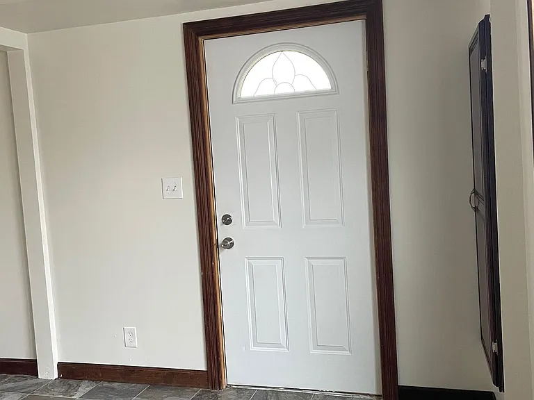 Front entrance into living room.