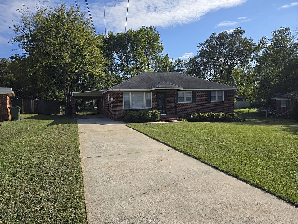 Front yard and carport