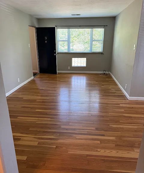 Large living room with hardwood floors