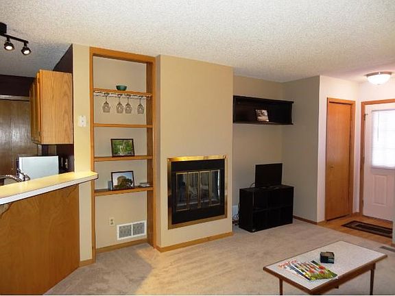 Built ins compliment the living area along with gas fireplace.
