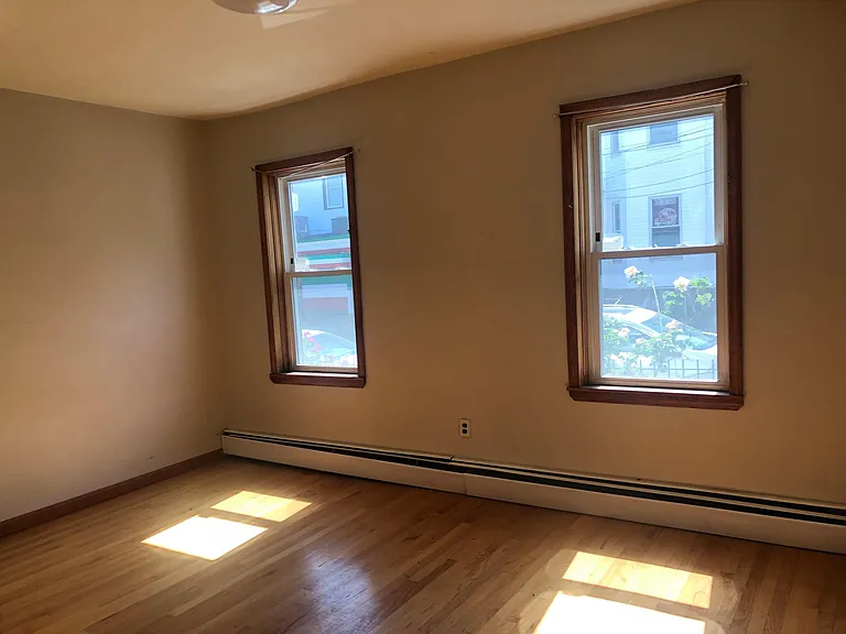 large 2nd bedroom, hardwood floors