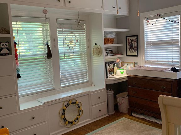 Front bedrooms with built in drawers and dream window.