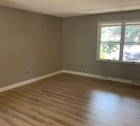 Living room from the dining room - windows face the front of the house