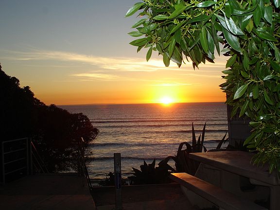 Beach access steps away.