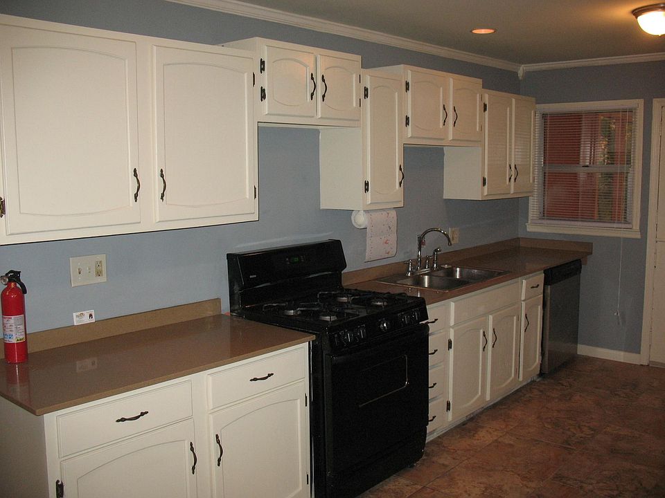 Nice size eat in kitchen, stove, refrigerator,  access to re