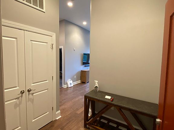 Entryway with large closet on the left right when you walk in.