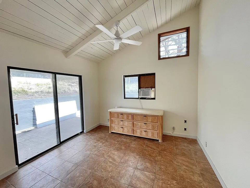 Bedroom with private patio and window A/C
