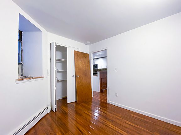 5th image of 417 E 12th St APT 1D