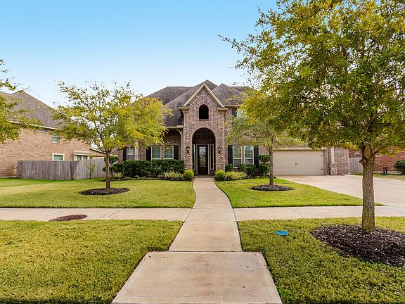 Expanded garage and driveway