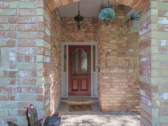 Covered front entry protect guests from inclement weather and provides protection from the sun.