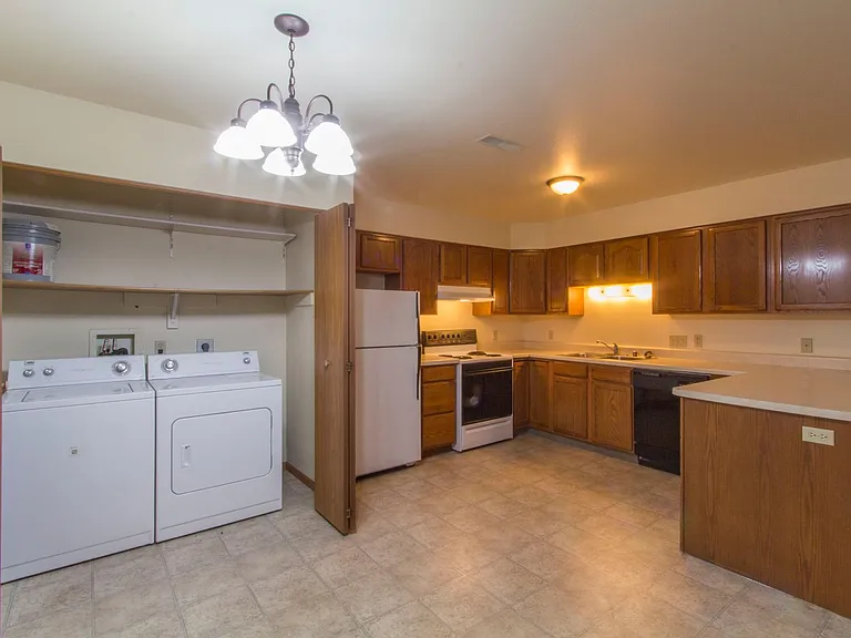 Whispering Pines Apartments — Photo 1