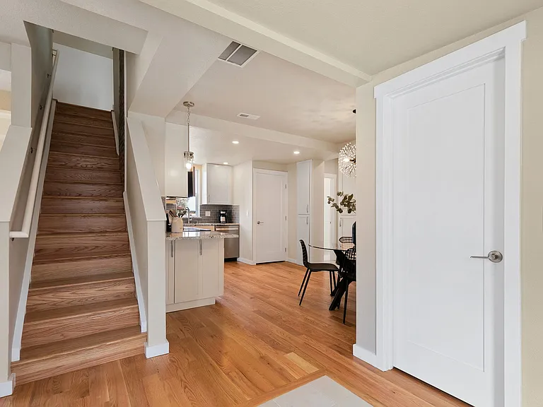 large storage and coat closet in entry thru door