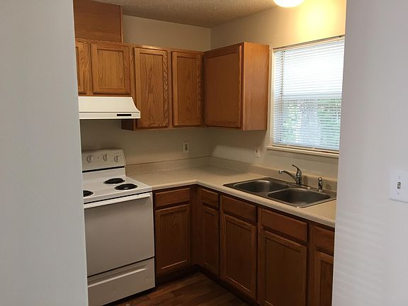 Kitchen, sink, stove, cabinets