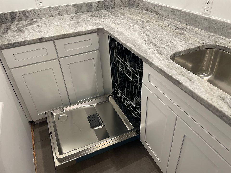 Kitchen: new cabinets, granite counters, and stainless steel appliances