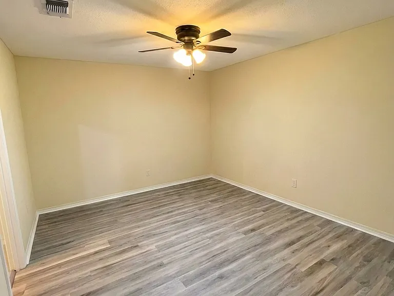 Guest Bedroom with new luxury Hickory Floors.