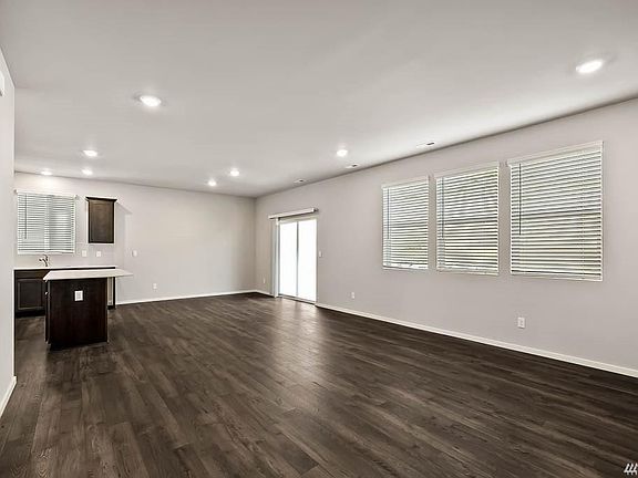 Great room to dining area - first floor is all laminate flooring.