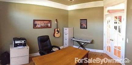 First Floor Den
						:
						Large den with French doors and crown molding