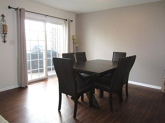 Open dining room with deck access