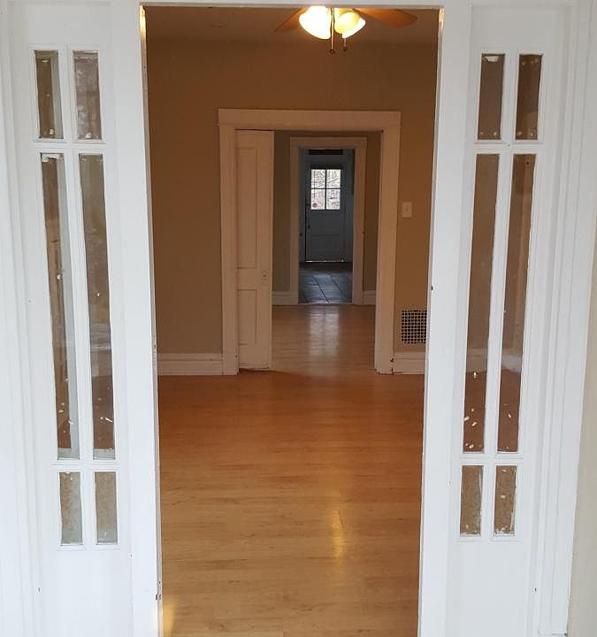 Sun room looking into bedroom