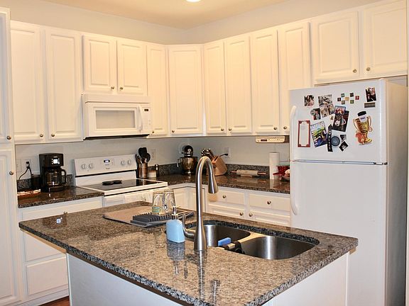 Kitchen with Granite Countertops (Dishwasher, Microwave, Disposal, Refrigerator, Electric Range)