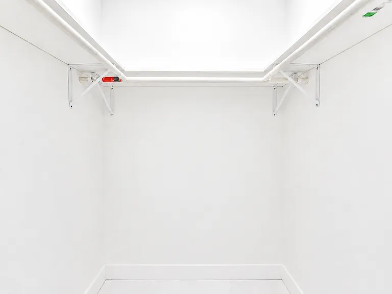 Primary Closet - two (one on either side of the small hallway)