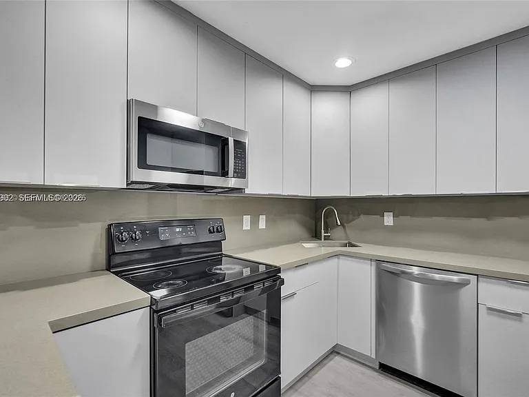 5963 NW 25th Ct #210 — Photo 10