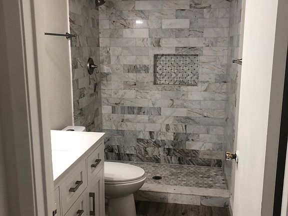 Master bathroom natural marble shower