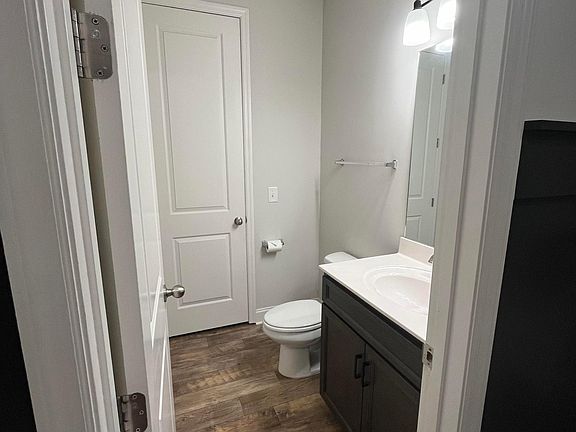 Downstairs half bath with linen closet