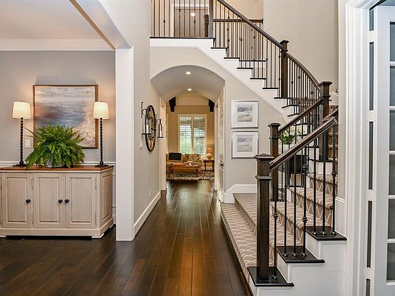 Your first introduction to the home will leave you amazed! Bright and spacious foyer with crown molding and wood flooring that runs through out the home.