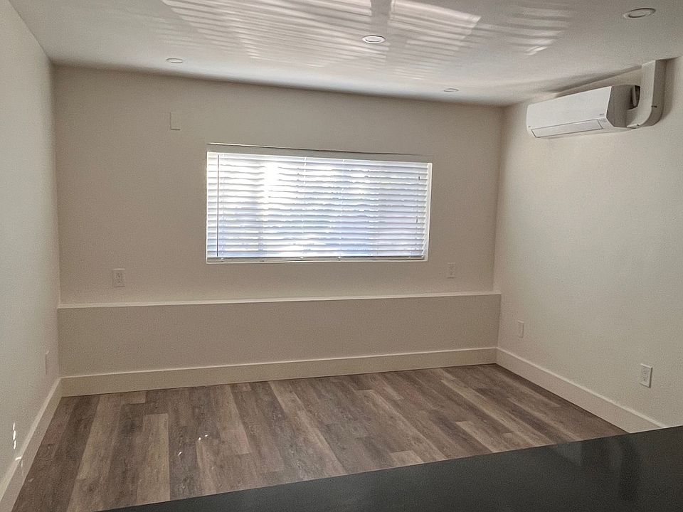 Living Area w/Picture Window, Blinds & Minisplit AC