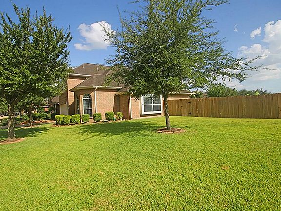 This beautiful home is located on a corner lot. This is a great place to toss the ball or just admire out the kitchen and breakfast room windows!