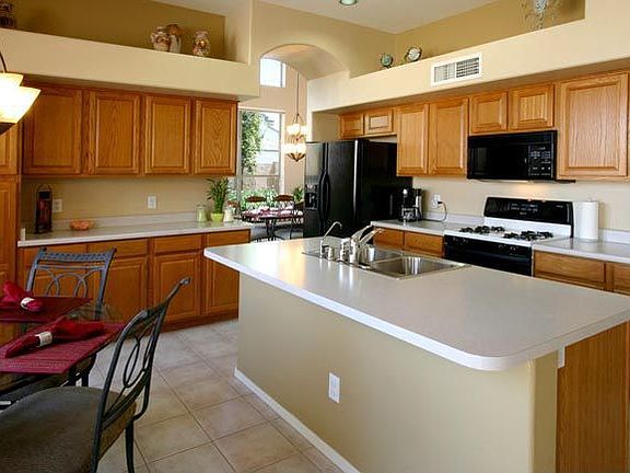 Kitchen has island and lots of counter space