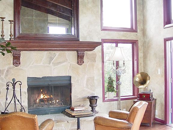 Living Room with floor to cieling fireplace 