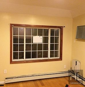 5th image of 11909 Farmers Blvd #2