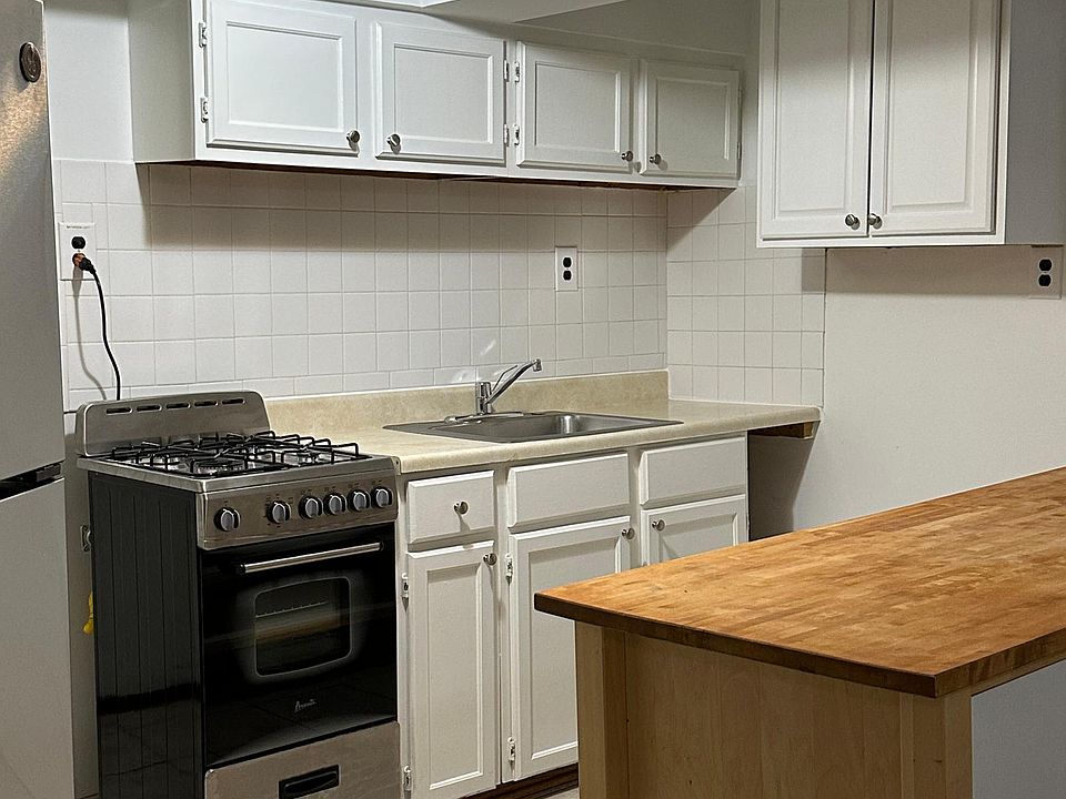 Kitchen with new stove and fridge