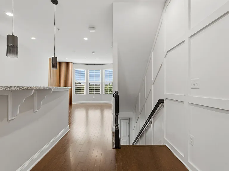 2nd-floor kitchen and dining area leading to the porch