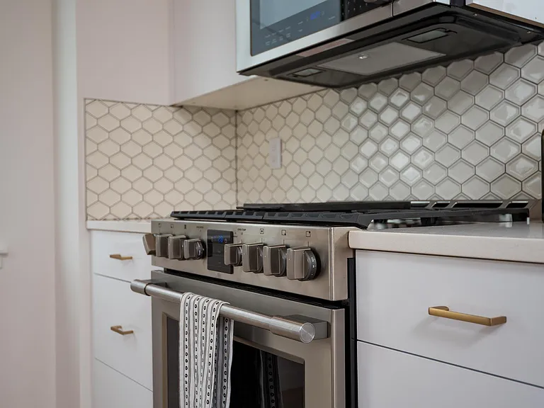 Kitchen with high-end appliances and ample storage