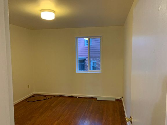 Second bedroom with two windows and big closet space