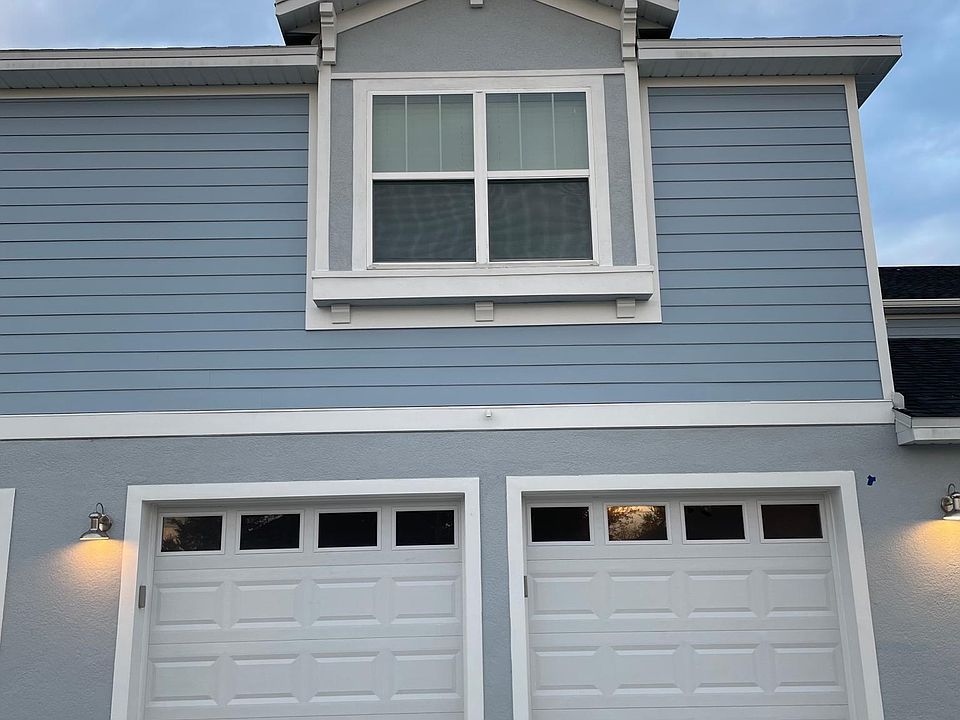 Outside view of apartment. Above garage