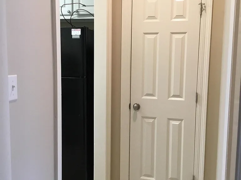 Pantry closet at hall to laundry and kitchen