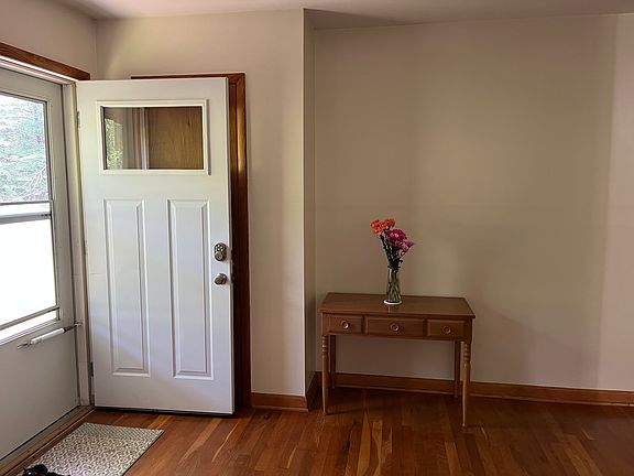 Entryway into open floor plan living/dining area.