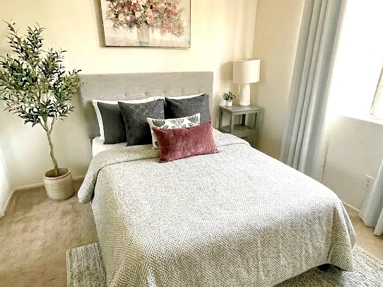 Furnished room. Nice natural light. Blackout curtains.