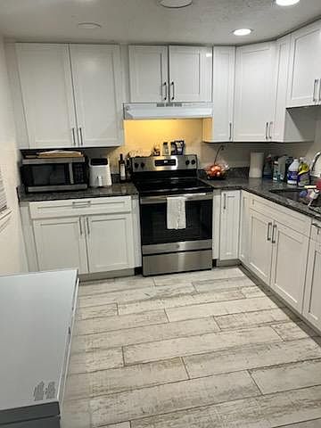 2nd image of 3890 1/2 46th Ave N #L