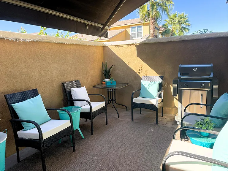 Patio with retractable awning. Unfurnished.