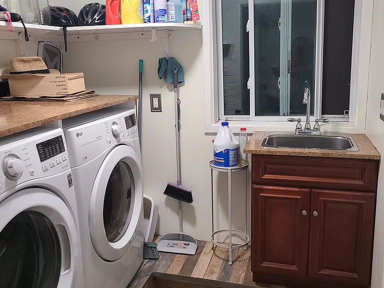 Laundry room with washer and dryer