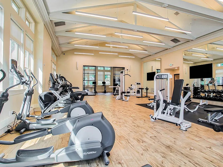 24-hour fitness center with modern equipment and cardio theater