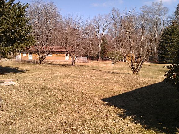 Garage with vegetable garden