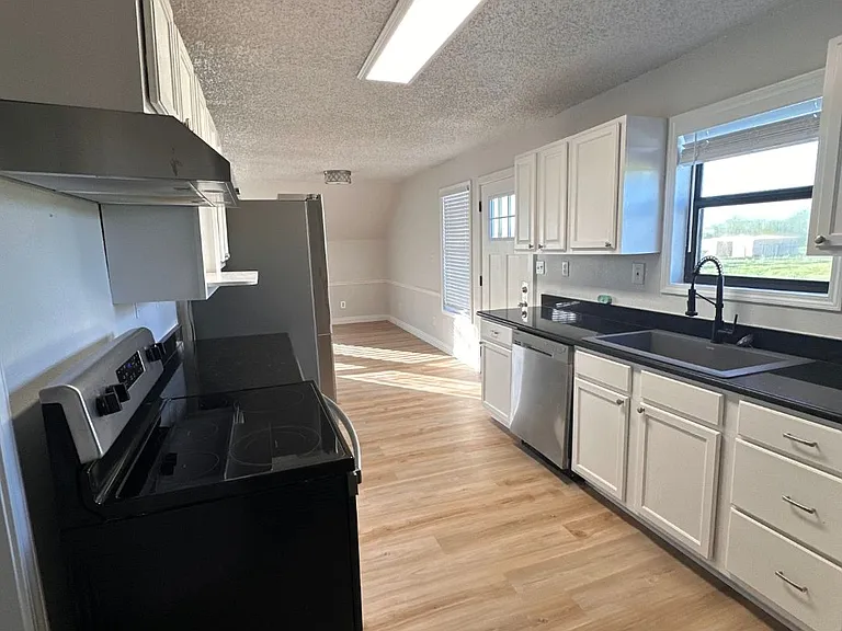Kitchen from laundry area.