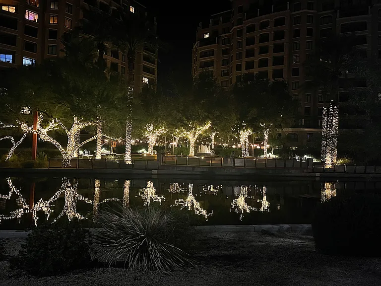 Pretty reflection of lights along the canal in walking distance.