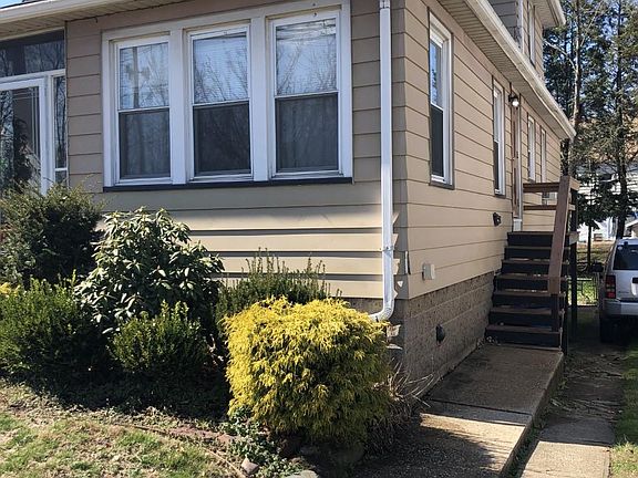 side door entrance to second floor apartment